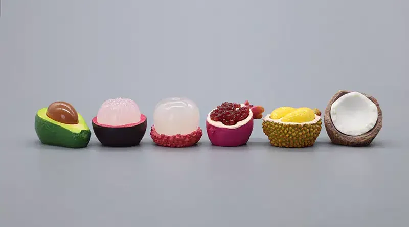Six fruit-shaped toys
